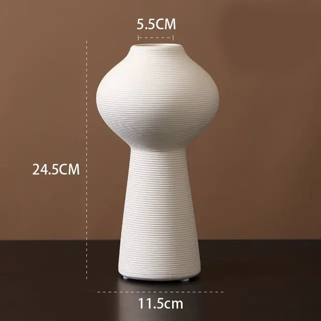 he M-sized Ceramic & Porcelain Tabletop Vase