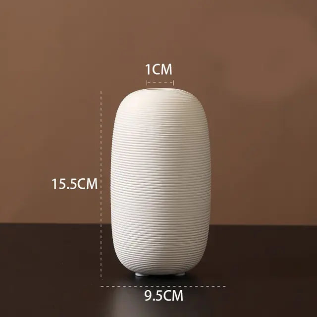 he M-sized Ceramic & Porcelain Tabletop Vase